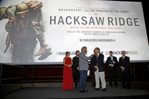  Mel Gibson, center, interviews Desmond Doss Jr., the son of Congressional Medal of Honor recipient Desmond Doss, at a screening of the movie "Hacksaw Ridge" at The National WWII Museum, in New Orleans, .