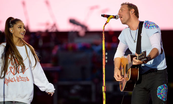 Ariana Grande performing 'Don't Look Back In Anger' with Chris Martin