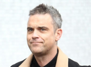 Robbie Williams Sympathises With Justin Bieber Over 