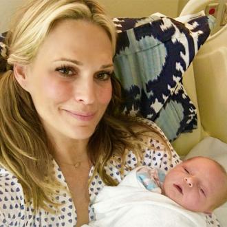 Molly Sims welcomes third child 