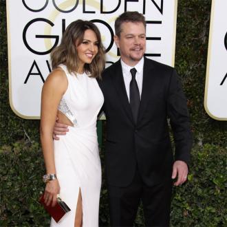 Matt Damon and Luciana Barroso look in love at concert 