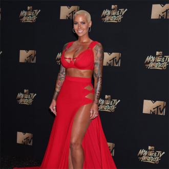 Amber Rose 'in love' with 21 Savage 